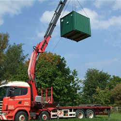 Lifting a portable cabin in to place